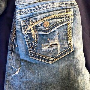 lightly worn silver skinny jeans